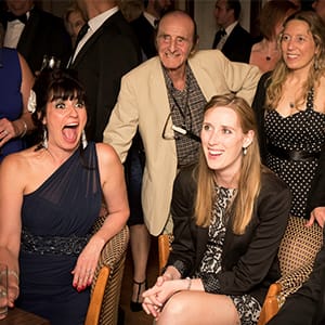 Close-up magician Roberto Forzoni amazes guests - two ladies scream after seeing Roberto's magic