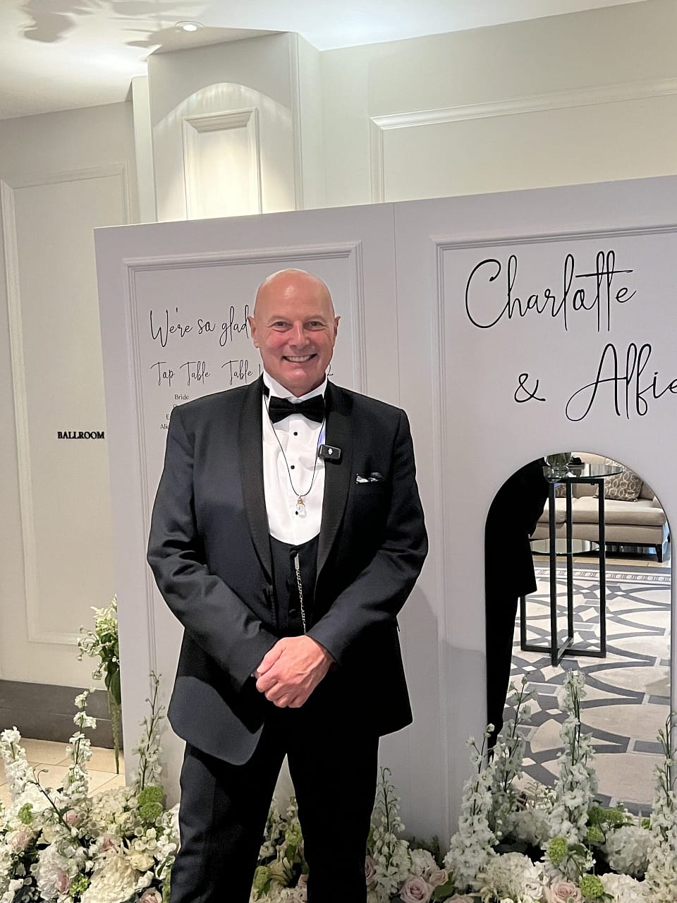 Magical Moments at a Stunning Corinthia Wedding. Image of Roberto in black tie.